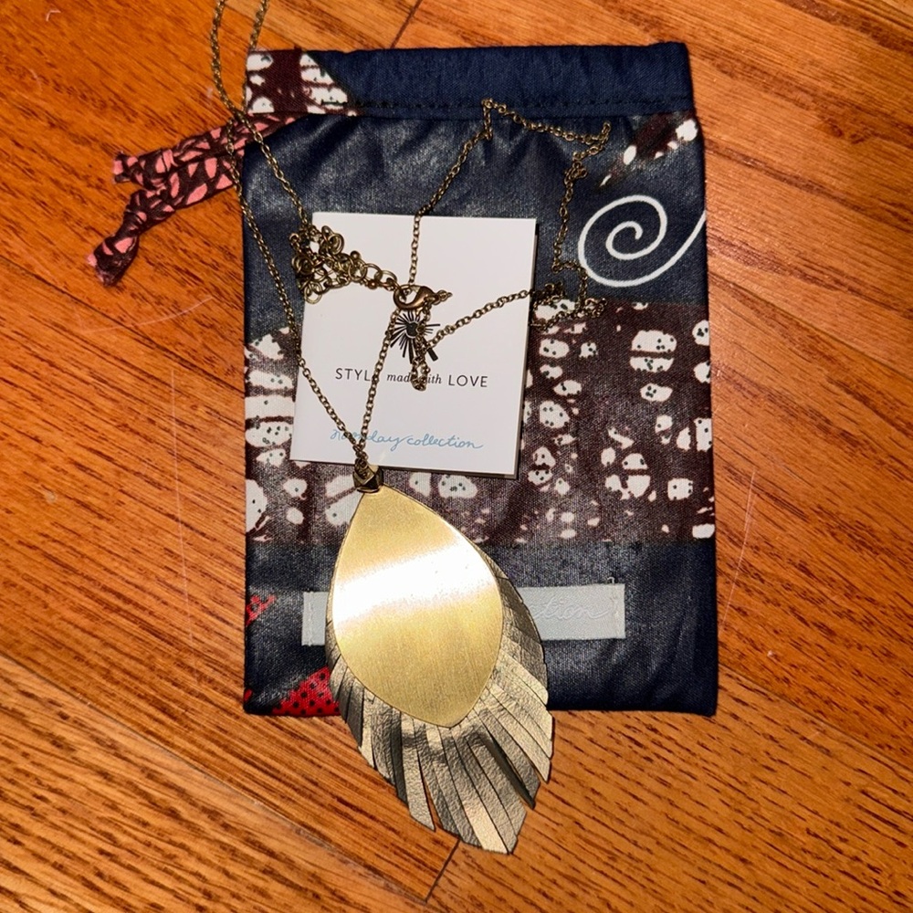 Noonday Leather Necklace two sided. One bronze and the other black